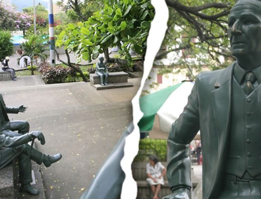 Esculturas de bronce verde de poetas vallecaucanos en el Parque de los Poetas de Cali, con bancas y árboles frente a la Iglesia de La Ermita.